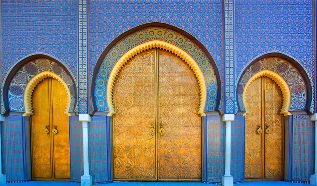 The stunning golden gates of the Royal Palace in Fes, Morocco – a masterpiece of traditional Moroccan craftsmanship