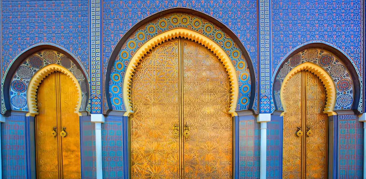 The stunning golden gates of the Royal Palace in Fes, Morocco – a masterpiece of traditional Moroccan craftsmanship